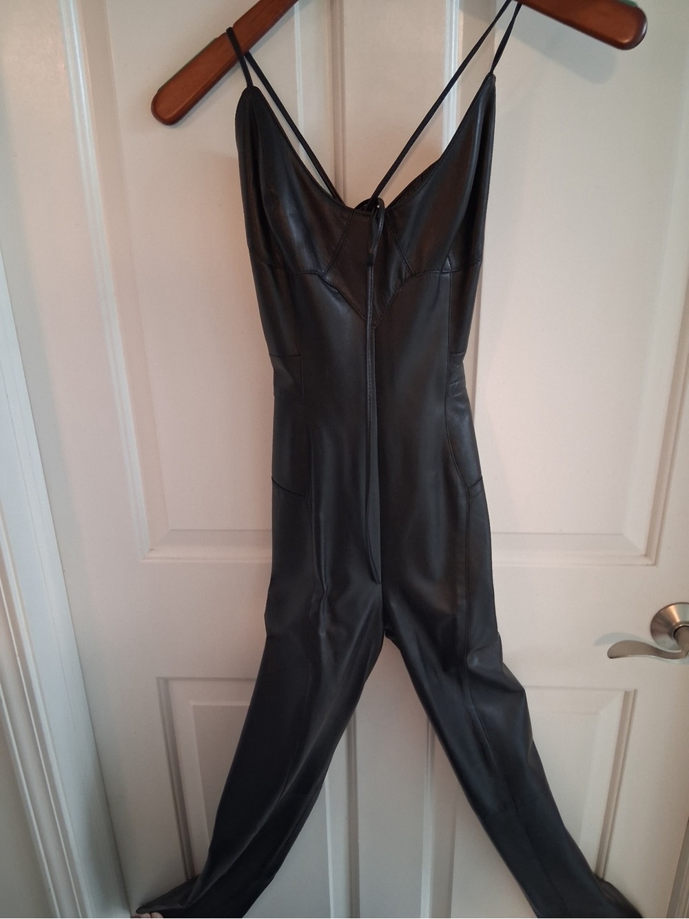 Sleek Black Faux-Leather Jumpsuit - Strappy Design